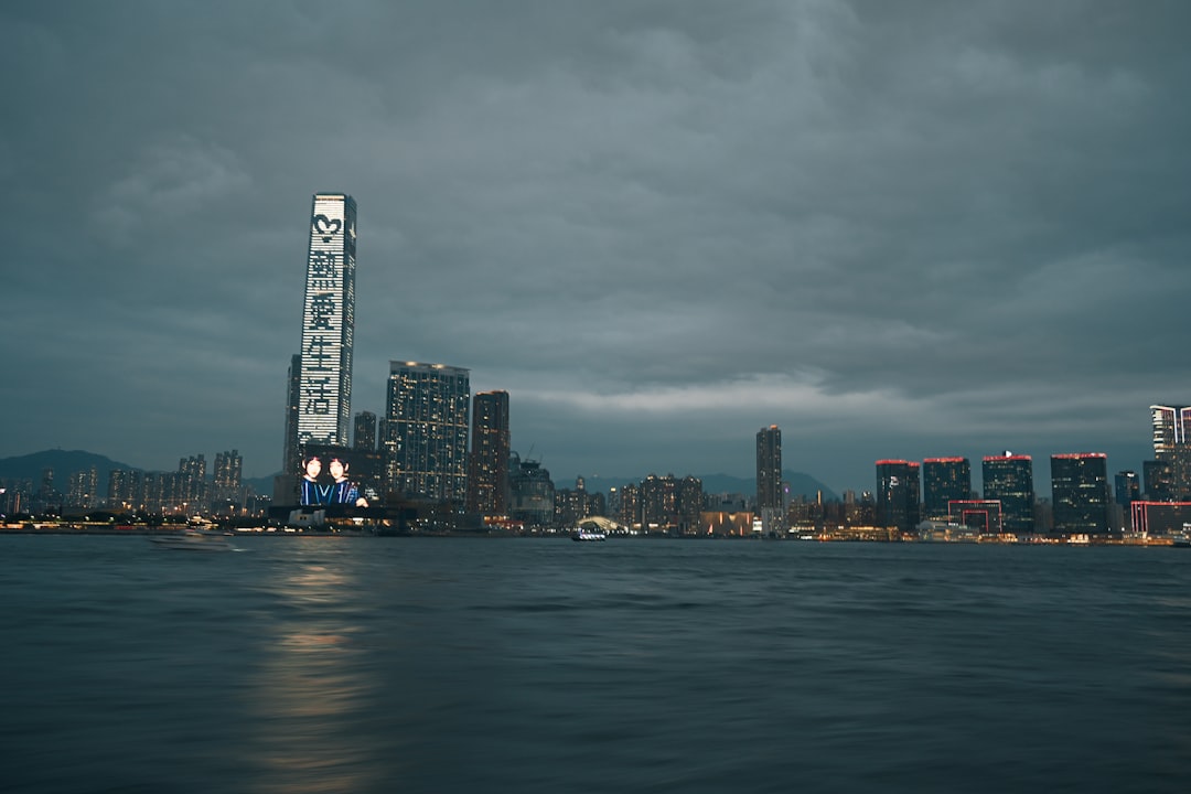 City skyline at night across water.