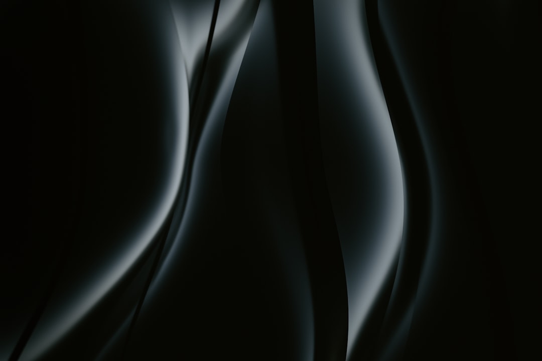 A black and white photo of a black background